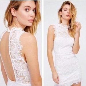 Free People white lace mini dress. NWT. Size Small.